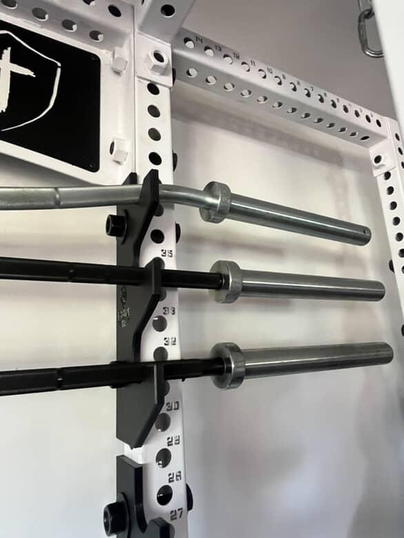 Rack mounted barbell storage